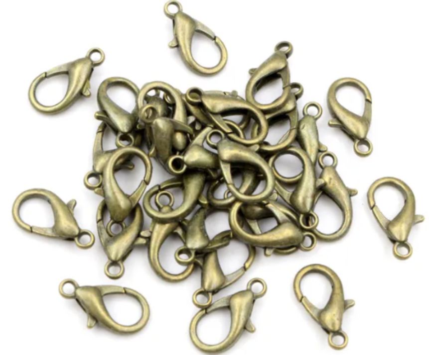 Pile of bronze 6 x 12mm lobster clasps with trigger openings, on a white background