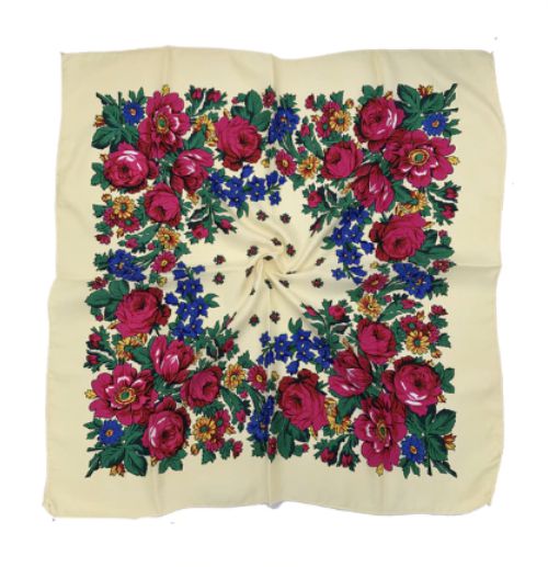 27 x 27 inch cream kokum scarf laid flat with a border of pink roses, blue flowers and green leaves