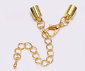 Gold cord end clasp with a 4mm hole, lobster clasp and extender chain