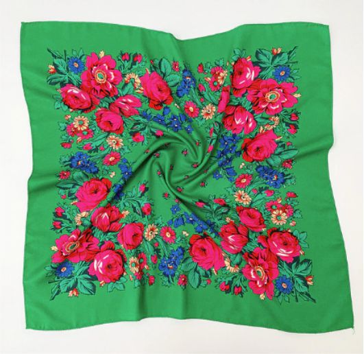 27 x 27 inch green kokum scarf laid flat with a border of pink roses, blue flowers and green leaves