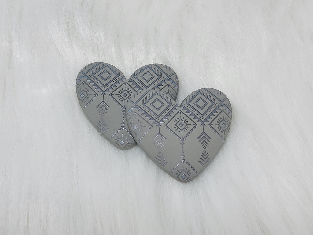Pair of 37mm resin heart cabochons (cabs) in matte grey with an embossed geometric pattern