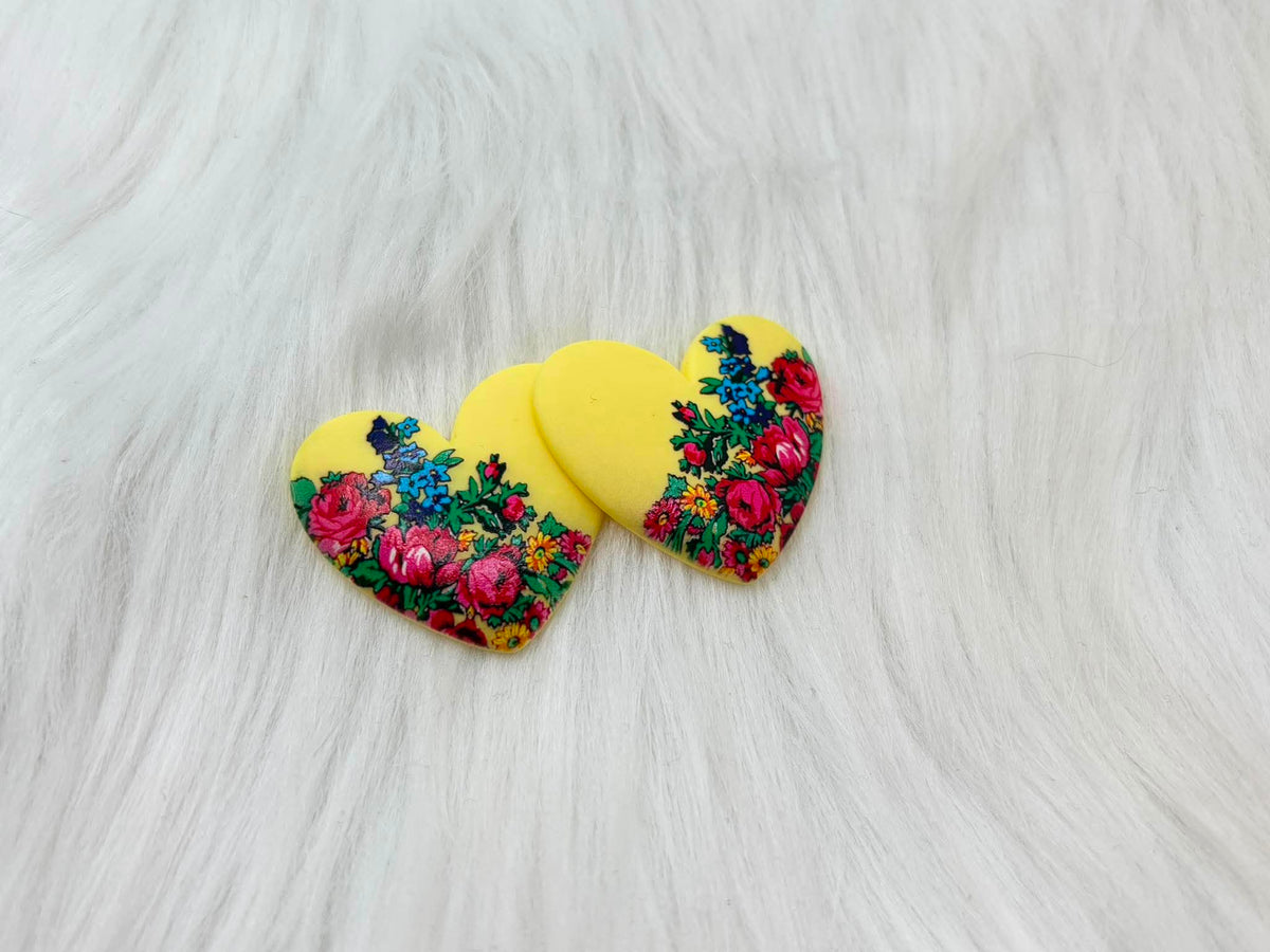 Pair of 37mm yellow resin heart cabochons (cabs) with a kokum floral design of pink roses and blue flowers