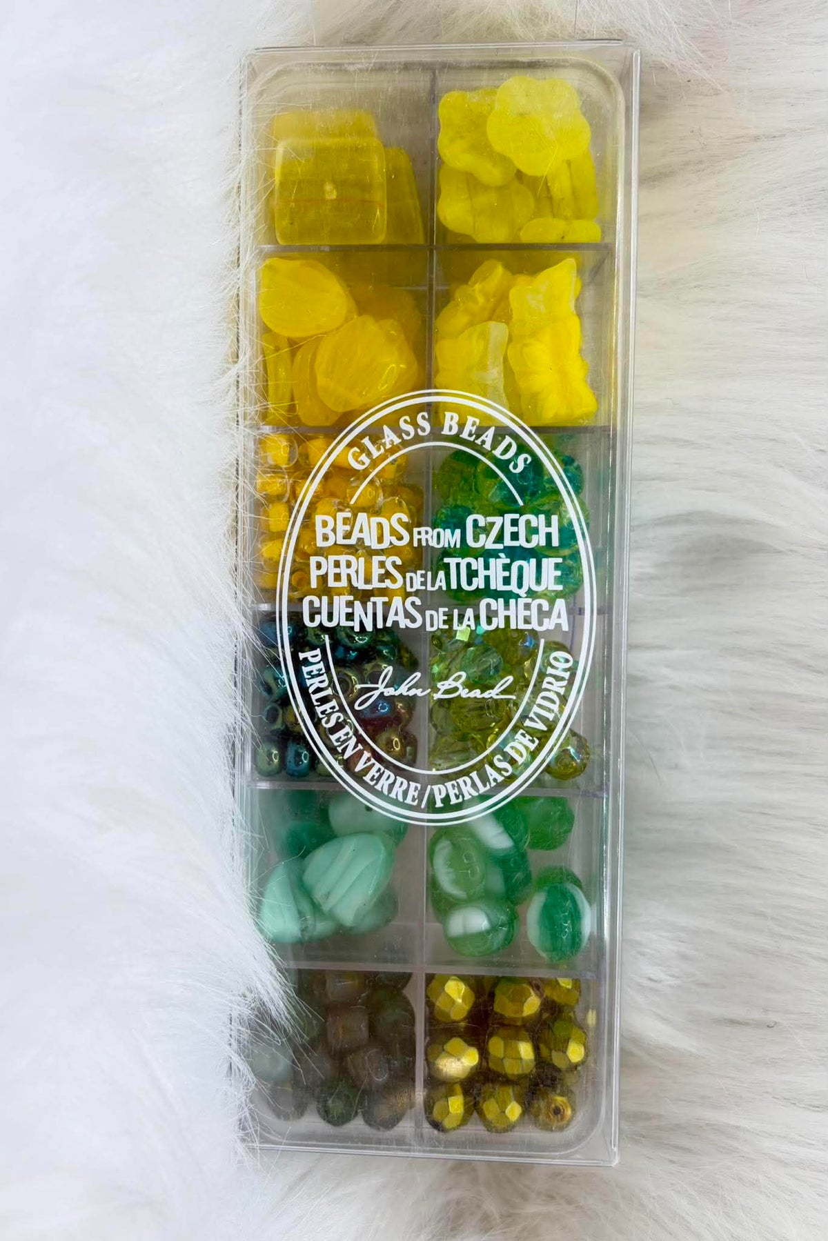 Divided case of assorted Czech glass beads, Citrus Sparkles, in yellows, greens and gold