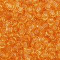 Close-up of Preciosa 11/0 Czech glass seed beads in transparent light topaz