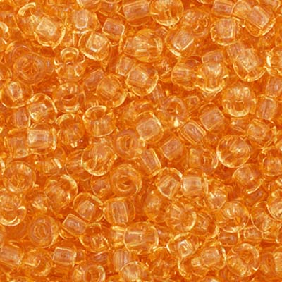 Close-up of Preciosa 11/0 Czech glass seed beads in transparent light topaz