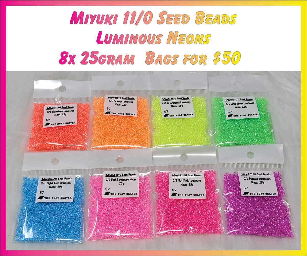 Eight 25g bags of 11/0 luminous neon seed beads in orange, peach, yellow, green, blue, pink, hot pink and magenta