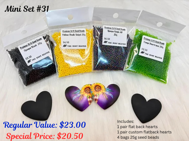 Mini set #31: black hearts, a pair of sunflower hearts and four bags of black, yellow, navy and green seed beads