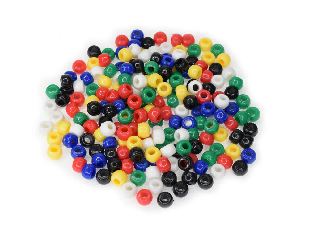 Pile of 6 x 9mm plastic pony beads in mixed opaque colours on a white background