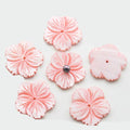 Carved pink mother of pearl flower pendants, 28mm, with a dark bead centre