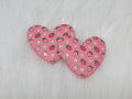 Pair of 37mm resin heart cabochons (cabs) in pink with a red strawberry and white flower pattern