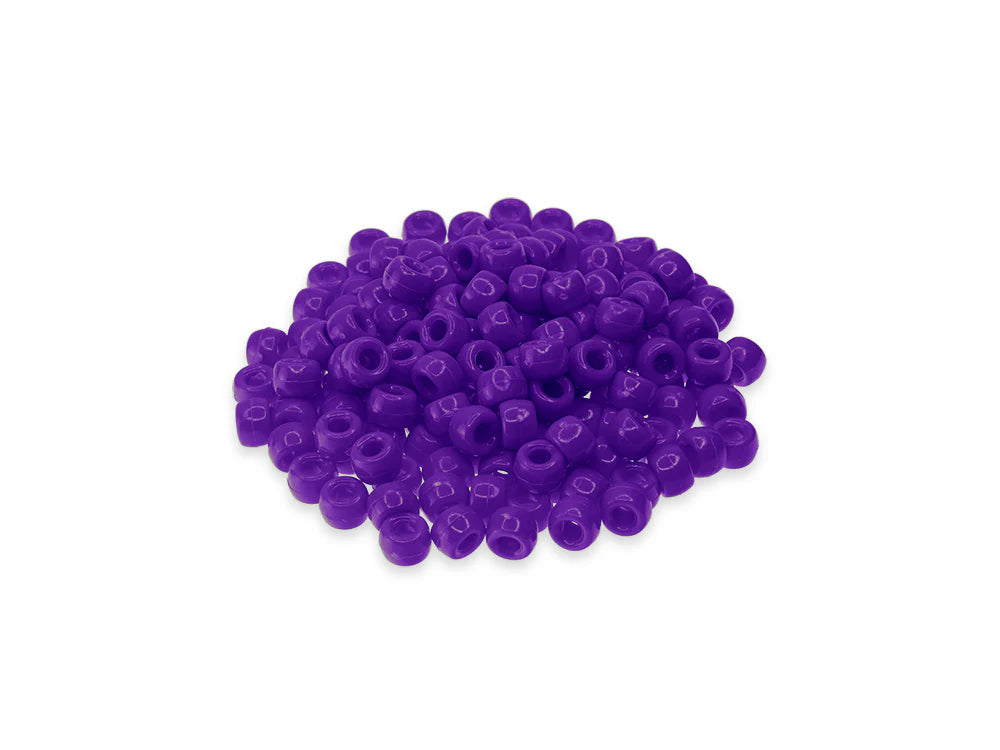 Pile of 6 x 9mm plastic pony beads in purple on a white background