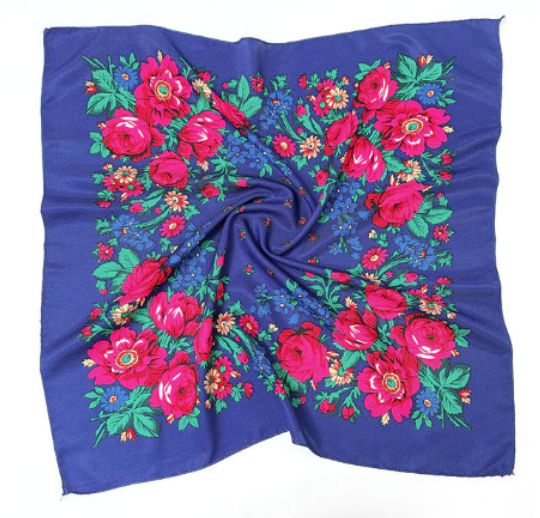 27 x 27 inch royal blue kokum scarf laid flat with a border of pink roses, blue flowers and green leaves