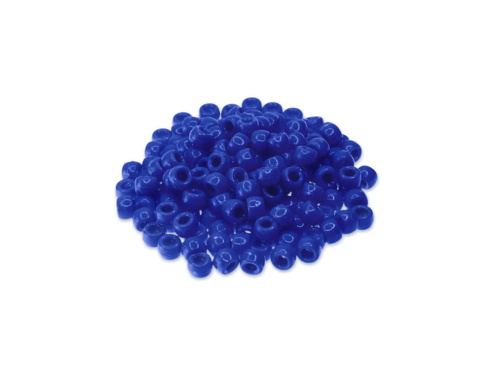 Pile of 6 x 9mm plastic pony beads in royal blue on a white background