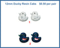 Two pairs of 12mm glittery resin duck cabochons (cabs), one silver pair and one dark blue pair
