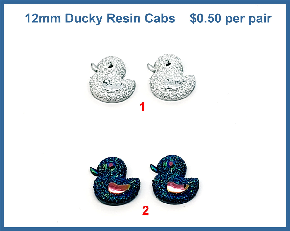 Two pairs of 12mm glittery resin duck cabochons (cabs), one silver pair and one dark blue pair