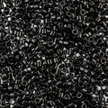 Close-up of Miyuki Delica 11/0 DB0010 cylinder beads in opaque black