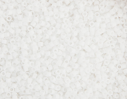 Close-up of Miyuki Delica 11/0 DB0200 cylinder beads in opaque chalk white