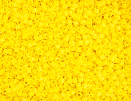 Close-up of Miyuki Delica 11/0 DB0721 cylinder beads in opaque yellow