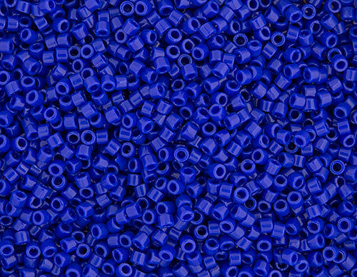 Close-up of Miyuki Delica 11/0 DB0726 cylinder beads in opaque cobalt blue