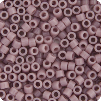 Close-up of Miyuki Delica 11/0 DB0728 cylinder beads in opaque mauve