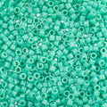 Close-up of Miyuki Delica 11/0 DB0759 cylinder beads in opaque turquoise green