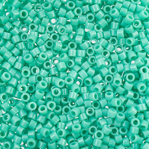 Close-up of Miyuki Delica 11/0 DB0759 cylinder beads in opaque turquoise green