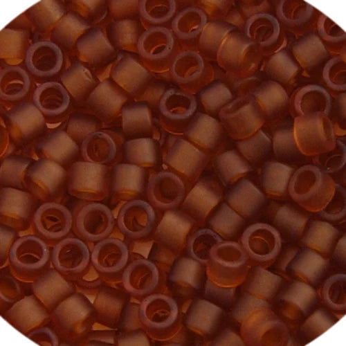 Close-up of Miyuki Delica 11/0 DB0764 cylinder beads in matte transparent amber