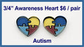 Pair of 3/4 inch puzzle heart cabochons (cabs) in blue, yellow and red, labelled Autism