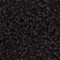 Close-up of Miyuki Delica 11/0 DB0310 cylinder beads in matte black