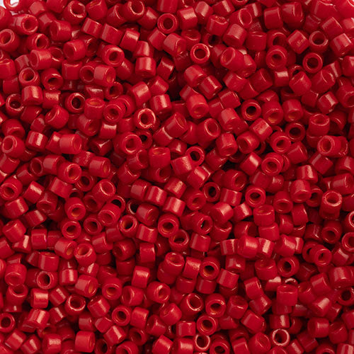 Close-up of Miyuki Delica 11/0 DB0791 cylinder beads in matte bright red