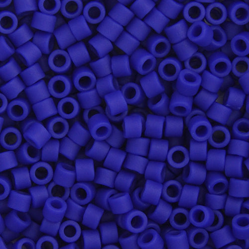 Close-up of Miyuki Delica 11/0 DB0756 cylinder beads in matte cobalt blue