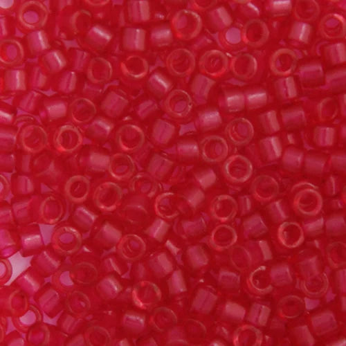 Close-up of Miyuki Delica 11/0 DB0775 cylinder beads in dyed matte transparent fuchsia