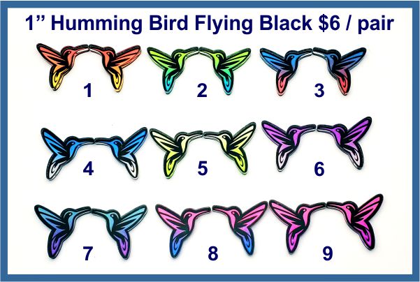 Nine pairs of 1 inch black acrylic flying hummingbird cabochons (cabs) with engraved wings in bright colours