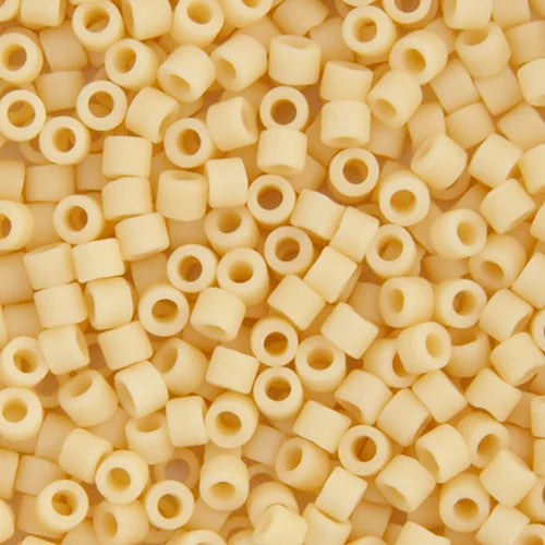 Close-up of Miyuki Delica 11/0 cylinder beads in an ivory pear shade