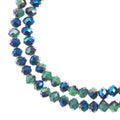 Two strands of Crystal Lane 3x4mm faceted glass rondelle beads in opaque dark green with a half blue iris