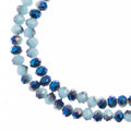 Two strands of Crystal Lane 3x4mm faceted glass rondelle beads in opaque light blue with a half blue iris