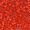 Close-up of Miyuki Delica 11/0 DB0795 cylinder beads in matte orange cinnabar