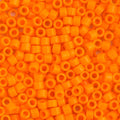 Close-up of Miyuki Delica 11/0 DB1133 cylinder beads in opaque orange mandarin
