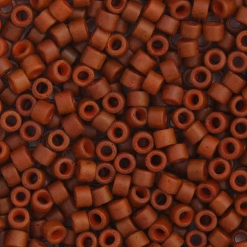 Close-up of Miyuki Delica 11/0 DB0794 cylinder beads in dyed matte sienna