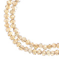 Two strands of Crystal Lane 3x4mm faceted glass rondelle beads in transparent topaz AB