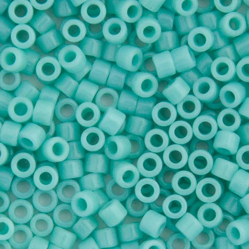 Close-up of Miyuki Delica 11/0 DB1136 cylinder beads in opaque turquoise sea opal