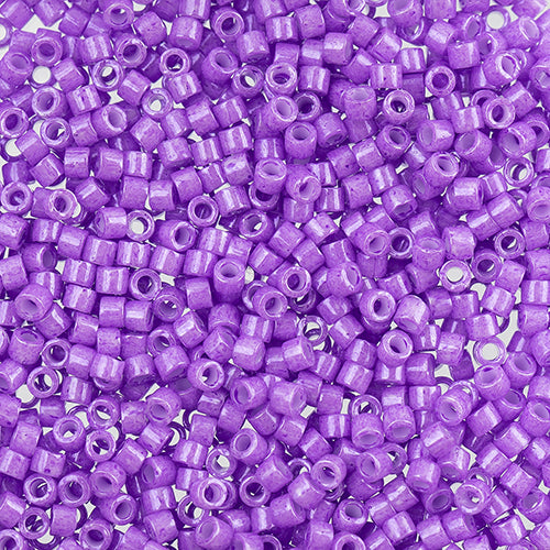 Close-up of Miyuki Delica 11/0 DB1379 cylinder beads in dyed opaque violet