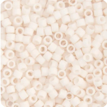 Close-up of Miyuki Delica 11/0 cylinder beads in a white bisque shade
