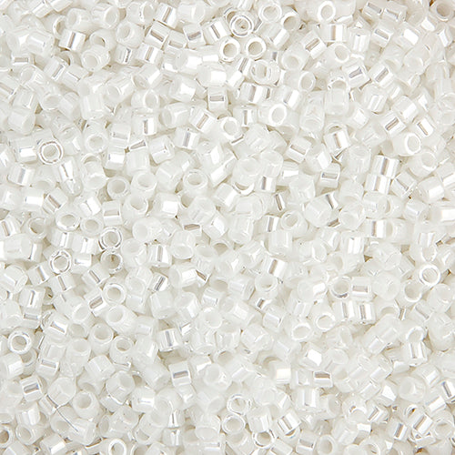 Close-up of Miyuki Delica 11/0 DB0201 cylinder beads in opaque white pearl with a luster finish