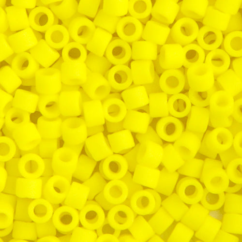 Close-up of Miyuki Delica 11/0 DB0751 cylinder beads in matte yellow